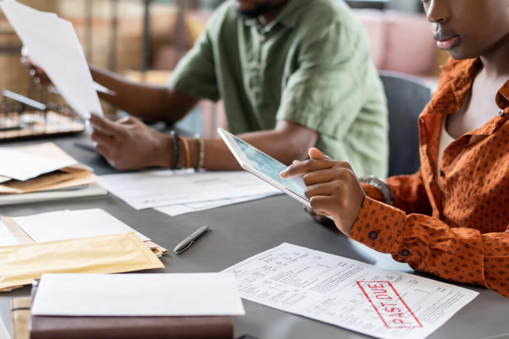 auditor pointing at tablet screen